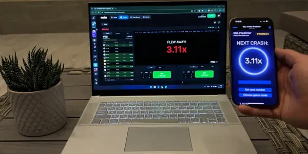 Aviator Predictor dashboard showing live crash prediction and win statistics